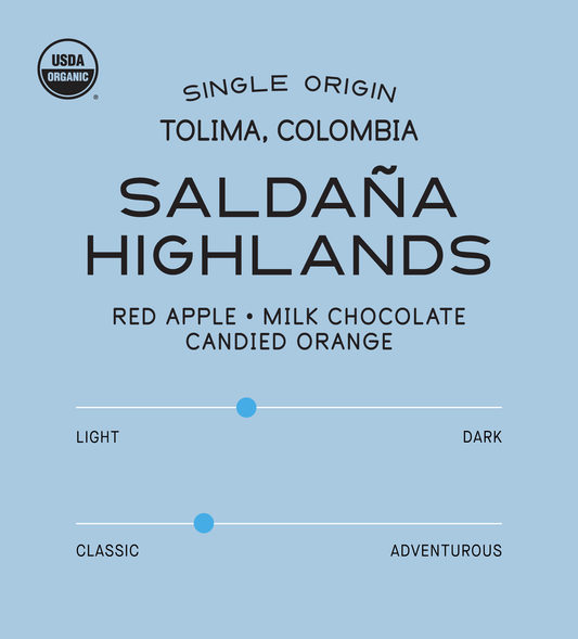 Verve Coffee Roasters - Saldana Highlands - Scent Profile - Single Origin - USDA Organic - Tolima, Colombia - Tasting Notes: Red Apple, Milk Chocolate, Candied Orange - Light + Classic